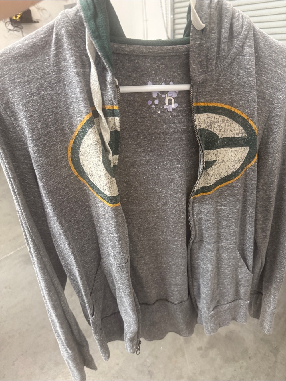 Source Unknown Gray Zip-Up Hoodie with Green and Gold Team Emblem